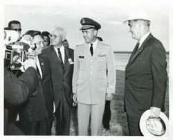 ["Black and white photograph print of Carl Albert, Lyndon B. Johnson, and others at the dedication of the Eufaula Dam and Reservoir. September 25, 1964"]
