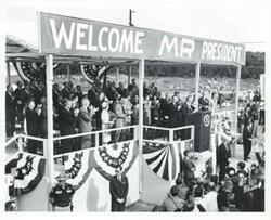 ["Black and white photograph print of John B. Connally, A. S. Mike Monroney, Lady Bird Johnson, Henry Bellmon, Carl Albert, Ed Edmondson, Lyndon B. Johnson, and others at the dedication of the Eufaula Dam and Reservoir by President Johnson. September 25, 1964"]