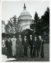 ["Black and white photograph print of the Oklahoma Delegation at the Kerr Memorial tree dedication. L to R: Carl Albert, Jed Johnson, Jr., A. S. Mike Monroney, Ed Edmondson, Page Belcher, Fred Harris, and Tom Steed. June 11, 1965"]