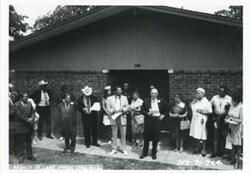 ["Black and white photograph print of Carl Albert at the dedication of the housing projects at Tishomingo. June 1971"]