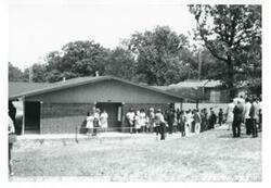 ["Black and white photograph print of Carl Albert at the dedication of the housing projects at Tishomingo. June 1971"]