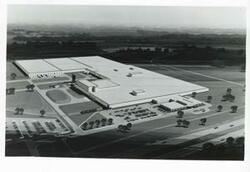 ["Black and white photograph print of an artist's drawing of the Dayton Tire and Rubber Company plant (Firestone) in Oklahoma City. 1969"]