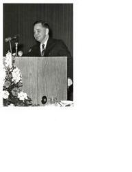 ["Black and white photograph print of Carl Albert giving a speech"]