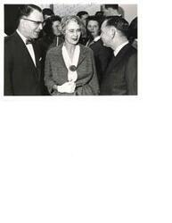 ["Black and white photograph print of Carl Albert, Marcus Cohn, and unidentified woman.  Photo signed by Marcus Cohn with message to Carl Albert"]