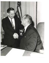 ["Black and White photograph of Carl Albert and President Lyndon B. Johnson"]