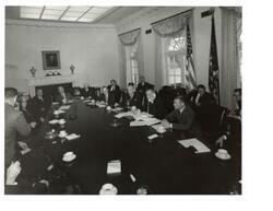["Black and White photograph of Lyndon B. Johnson and a National Security Council meeting.  Those present include:  George Aiken, Carl Albert, Averell Harriman, and Robert S. McNamara. April 3,1964"]