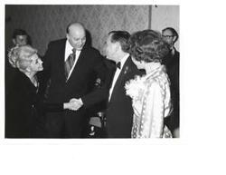 ["Black and White photograph of Carl Albert and his wife with an unidentified couple at the Carl Albert appreciation dinner."]