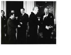 ["Black and white photograph of Carl Albert and John W. McCormack in a receiving line. Lyndon B. Johnson is there."]