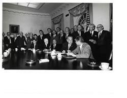 ["Black and white photograph of meeting with President Johnson.  Those present in the room include: Vice-President Hubert Humphrey; George Aiken, Hale Boggs, Carl Albert, Everett M. Dirksen, Charles Halleck, Carl Hayden,  Mike Mansfield, John W. McCormack, and Robert S. McNamara."]