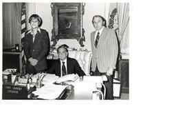 ["Black and white photograph of Carl Albert with Dr. Wayne Ashley (right) and son Jeff (left) from LaSalle, Illinois."]