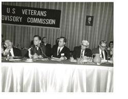 ["Black and white photograph of Carl Albert at the meeting of the U.S. Veterans Advisory Commission. Oklahoma City, Oklahoma, Oct. 1967.  Ed Edmondson is seated right of Carl Albertson."]