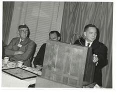 ["Black and white photograph of Carl Albert at a D.A.V. dinner honoring him."]