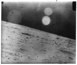 ["Black and white photograph of Moon taken by Surveyor I. June 1966"]