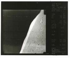["Black and white photograph of Moon taken by Surveyor I. June 1966"]