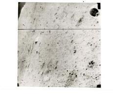 ["Black and white photograph of Moon taken by Surveyor I. June 1966"]