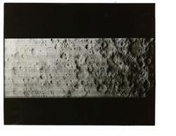 ["Black and white photograph of Moon taken by Orbiter I. August 18,1966."]