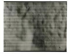 ["Black and white photograph of Moon taken by Orbiter I. August 18,1966."]