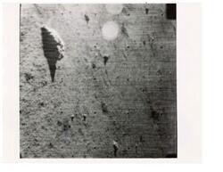["Black and white photograph of Moon taken by Surveyor I. June 1966"]