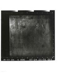 ["Black and white photograph of Mars by Mariner IV. July 14, 1967"]