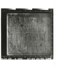 ["Black and white photograph of Mars by Mariner IV. July 14, 1967"]