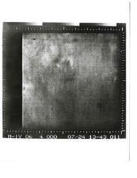 ["Black and white photograph of Mars by Mariner IV. July 14, 1967"]
