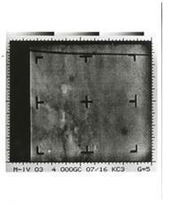 ["Black and white photograph of Mars by Mariner IV. July 14, 1967"]