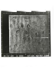["Black and white photograph of Mars by Mariner IV. July 14, 1967"]