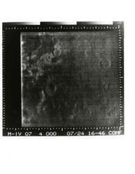 ["Black and white photograph of Mars by Mariner IV. July 14, 1967"]