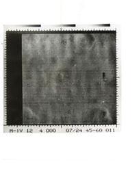 ["Black and white photograph of Mars by Mariner IV. July 14, 1968"]