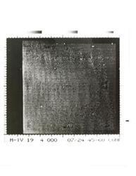 ["Black and white photograph of Mars by Mariner IV. July 14, 1975"]