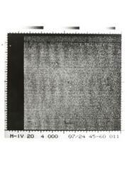 ["Black and white photograph of Mars by Mariner IV. July 14, 1976"]