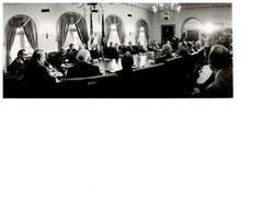 ["Black and white photograph of a White House Bipartisan Meeting. January 23, 1974 Present are Carl Albert, Robert C. Byrd, Gerald R. Ford, Mike Mansfield, Richard M. Nixon, Thomas P. O'Neill, John Rhodes, and Hugh Scott."]