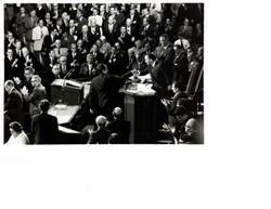 ["Black and white photograph of Richard M. Nixon after giving his State of the Union address. Carl Albert is also pictured."]