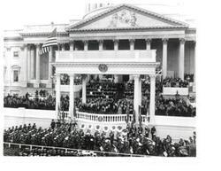 ["Black and white photograph of Richard M. Nixon being sworn in for a second term. January 20, 1973"]