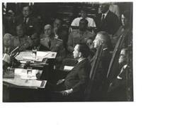 ["Black and white photograph of Carl Albert seated in the Speaker's chair."]