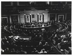 ["Black and white photograph of a joint session of Congress. Carl Albert in Speaker's Chair."]