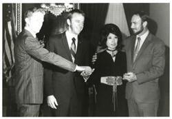 ["Black and white photograph of Carl Albert with astronauts Roosa, Alan B. Shepard, Edwin? Mitchell. Albert staff members Tamara Kitchens and Sue Thompson in photos 3728-2729 and 3733"]