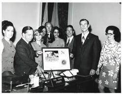 ["Black and white photograph of Presentation of Apollo 15 plaque in Speaker's office. July 26, 1971"]