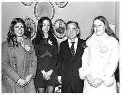 ["Black and white photograph of Carl Albert with three presidential classroom young Americans."]