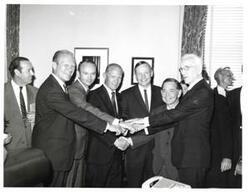 ["Black and white photograph of John W. McCormack, Carl Albert, and Gerald R. Ford with astronauts Neil Armstrong, Edwin Buzz Aldrin, and Michael Collins. (interior)."]