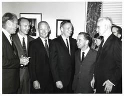 ["Black and white photograph of Carl Albert congratulating an unidentified man"]