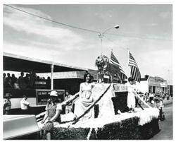 ["Black and white photograph of Float at Armed Forces Day parade in McAlester, Oklahoma. 1973"]