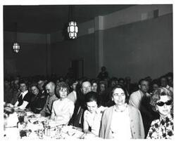 ["Black and white photograph of the speakers' a banquet in McAlester, Oklahoma on Armed Forces Day 1972"]