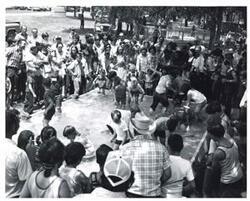 ["Black and white photograph of \"hogging\" for fish in McAlester, Oklahoma.  Armed Forces Day 1973"]