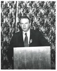 ["Black and white photograph of Henry Bellmon in McAlester, Oklahoma on Armed Forces Day. 1973"]
