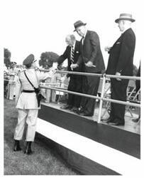 ["Black and white photograph of a retreat review honoring Army veterans in Congress. June 12, 1960."]