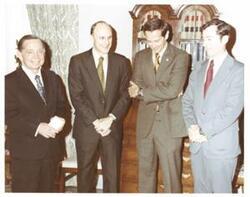 ["Color photograph of Carl Albert with astronauts in Speaker's office."]
