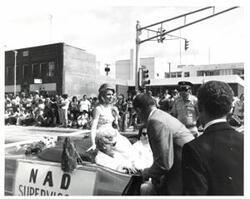 ["Black and white photograph of parade scenes in McAlester, Oklahoma on Armed Forces Day. 1974"]