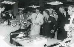 ["Black and white photograph print of Carl Albert standing with several men during the House delegation trip to USSR, Romania, Yugoslavia. August 1975"]