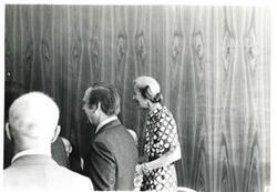 ["Black and white photograph print of Millicent Fenwick talking with others. House delegation trip. August 1975"]
